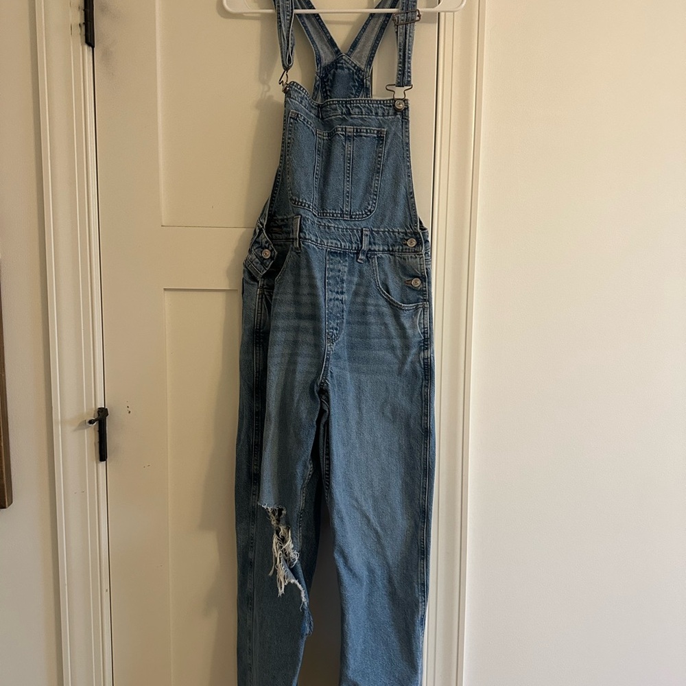 Classic Blue Denim Overalls American Eagle with rip at knee
